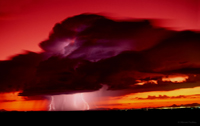 Sunset storm colors over desert captured by storm photographer Warren Faidley