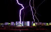 Close lightning strike in Tucson by storm photographer Warren Faidley